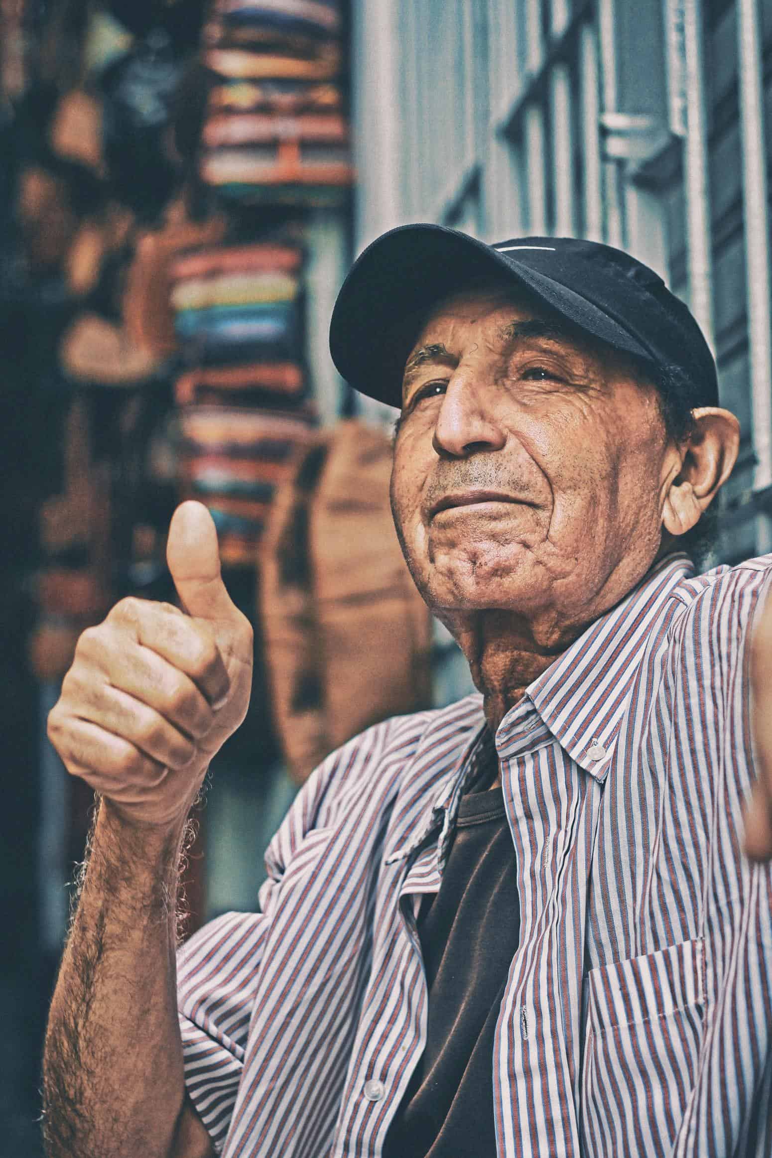 thumbs up elderly gentleman