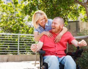 disabled man and caregiver