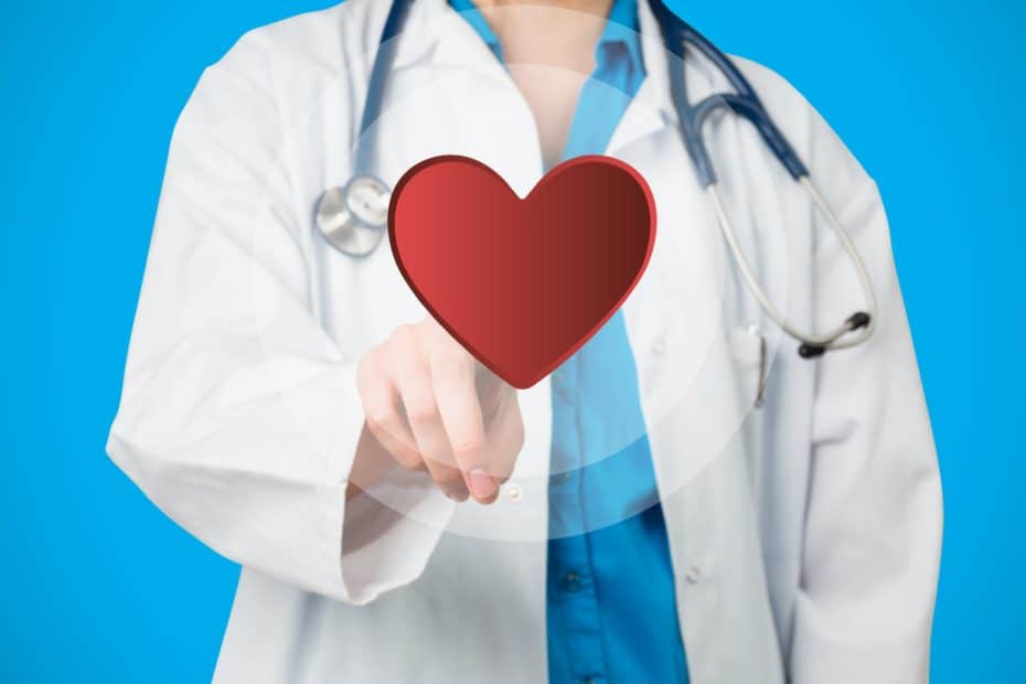 Digital composition of doctor pretending to touch heart against blue background